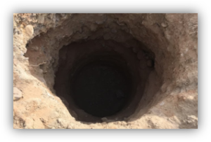A hole excavated for a utility transmission pole