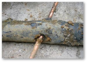 An earth rod punctured straight through a power cable
