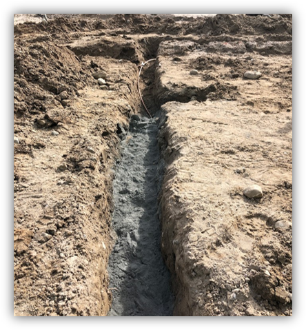 A lateral excavation with Conducrete installed over bare cable